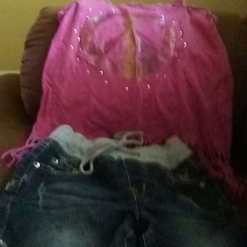 Pink peace sign shirt and denim shorts